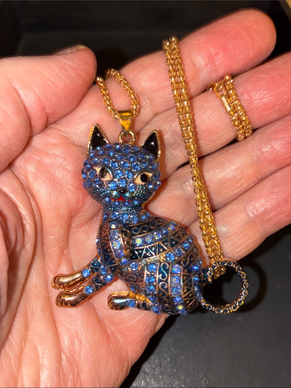 Cat Pendant Richly Encrusted in Blue Crystals.